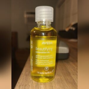 Aveda Beautifying Composition Oil in Vibrant Yellow